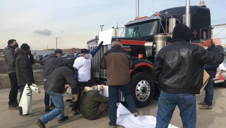 Light armoured vehicles manufactured by General Dynamics Land Systems, in London, Ontario, are being transported to port by Paddock Transport International, where they are loaded onto Saudi ships