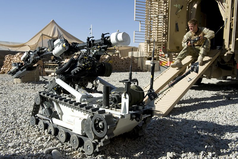 A soldier operates the remote controlled Mark 8 Wheel Barrow Counter IED Robot